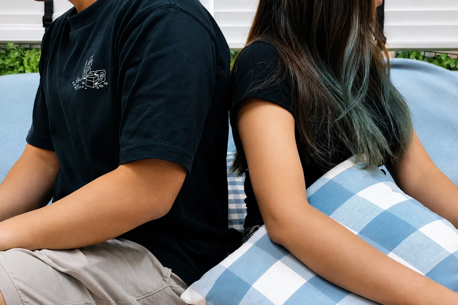 Couple covering their face stressed about infidelity