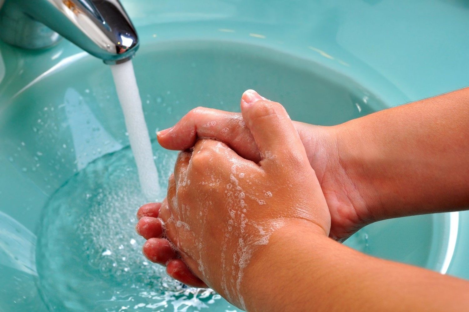 Person washing hand non-stop due to Obsessive-Compulsive Disorder
