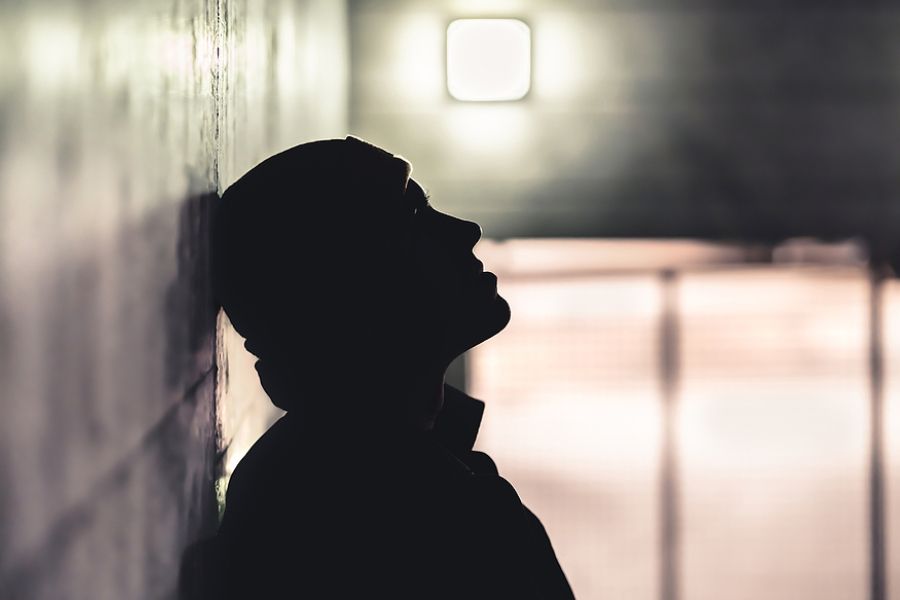 Silhouette of man recovering after trauma