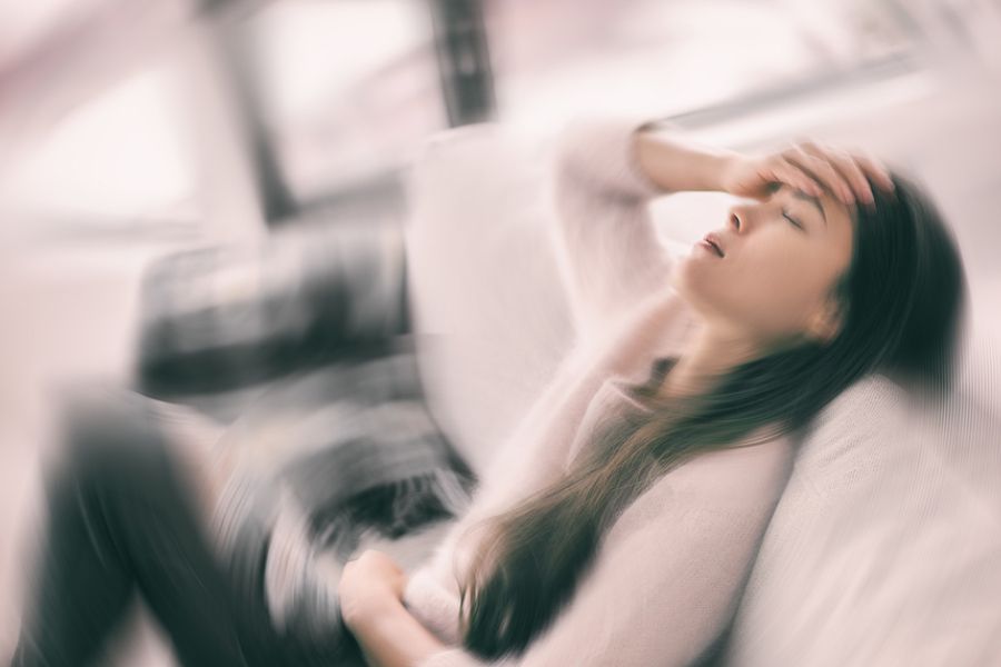Blurred image of woman spinning out of control